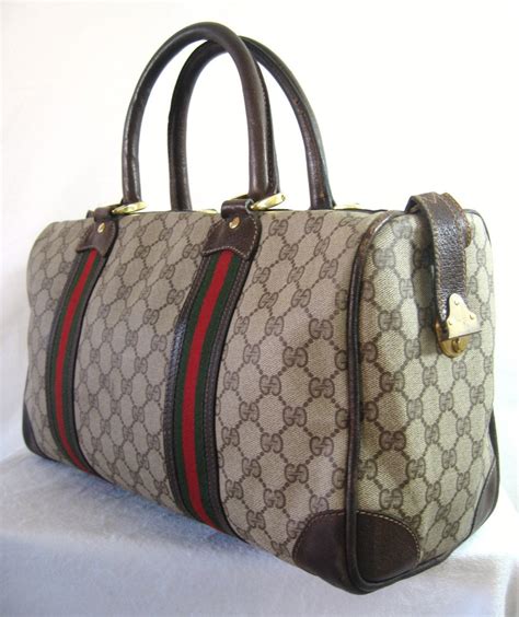 double bag gucci|Gucci duffle bag used.